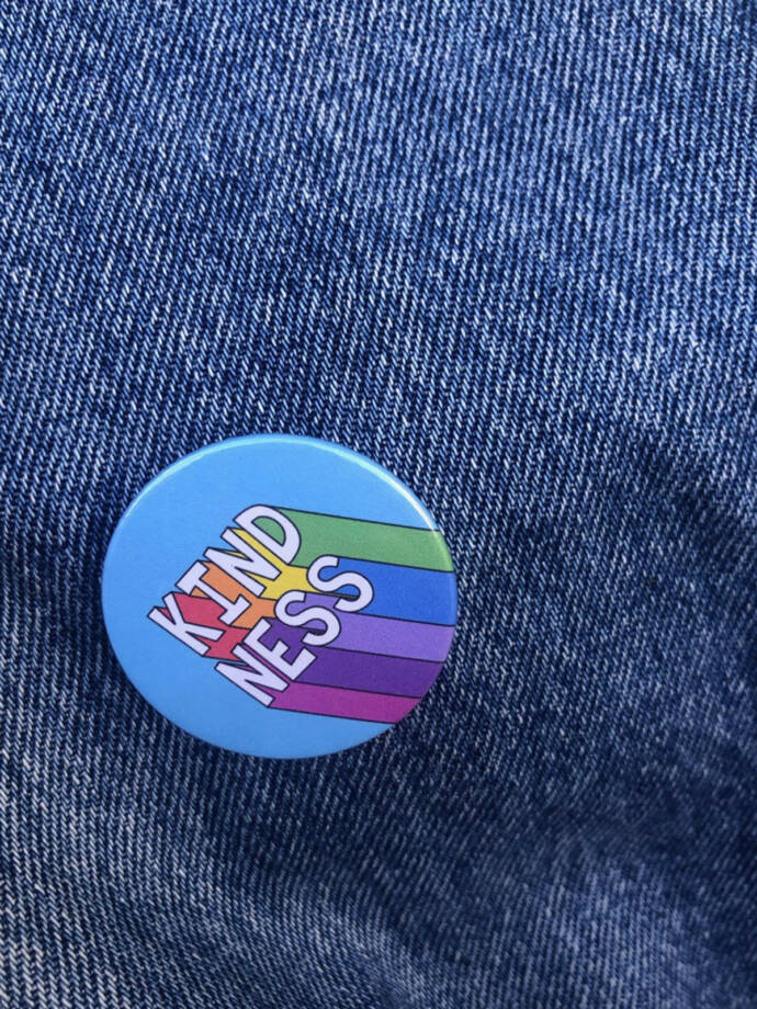 colourful badge with Kindness lettering