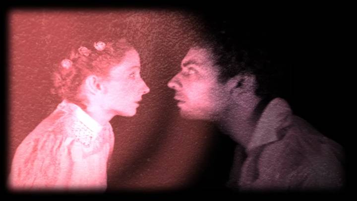 Imagery from 1927 studios' Turangalila film - a man and woman face each other looking shocked